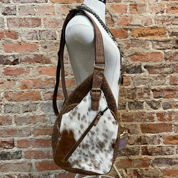 MYRA CROSSBODY SATUAL LEATHER IN BROWN AND WHITE COWHIDE